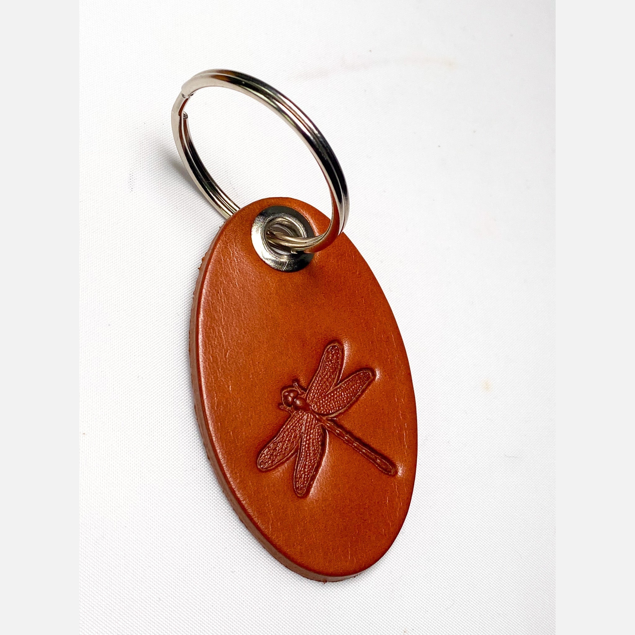 Leather keyring Bag Charm Oval Dragonfly Design Tan Colour